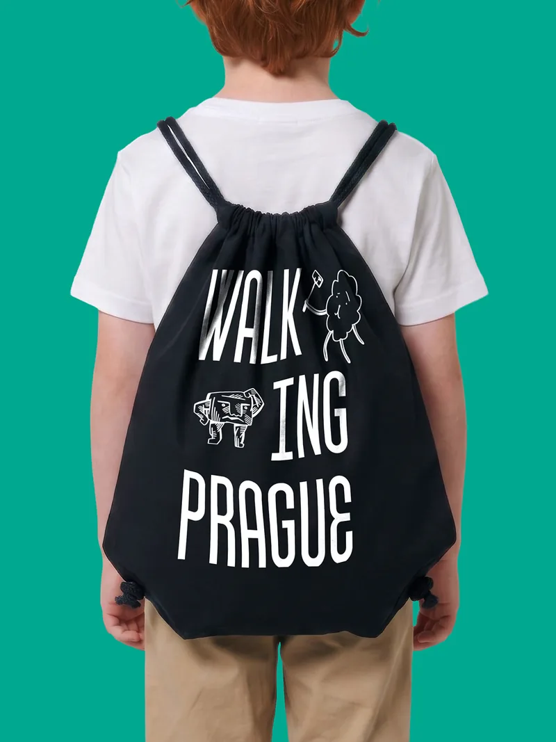A child wearing the Walking Prague backpack