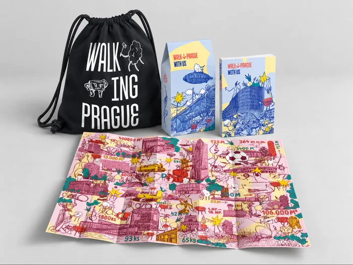 The Walking Prague backpack, box, book and an unfolded map